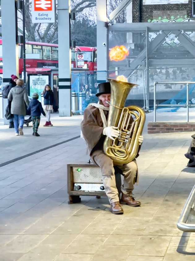 A wonderful man, playing the euphonium that spits out flames outside of Ealing Broadway underground station